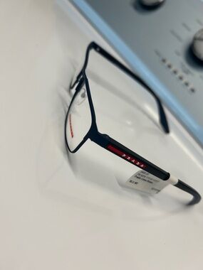 Prada Blue Metal Eyeglasses with Red Temple Accent
